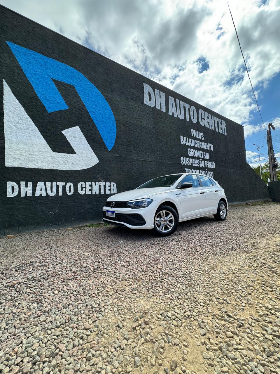 Fachada da DH Auto Center com mural